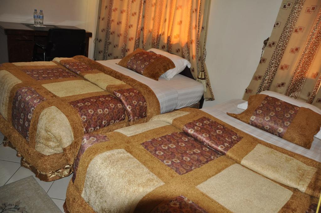 Rich Hotel Arusha Habitación foto