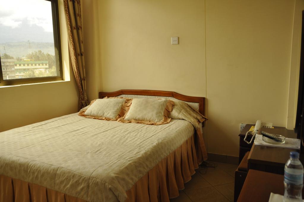 Rich Hotel Arusha Habitación foto